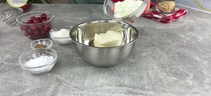 Frischkäse und Magerquark in einer Schüssel glatt rühren.