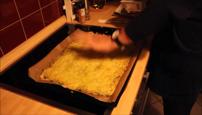 Frischkäse auf dem abgekühlten Spinat verteilen.