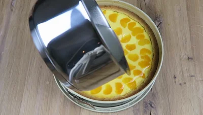 Käse-Mandarinenkuchen Rezept: Saftiger Quarkkuchen einfach selbstgemacht!