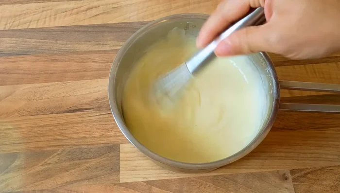 175 g Frischkäse unterrühren.