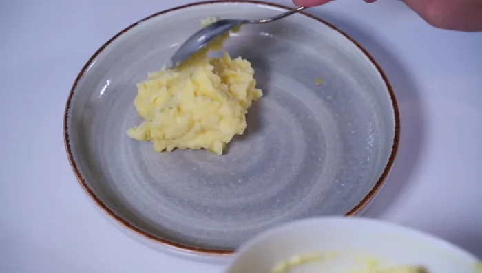 Kartoffelstampf zubereiten.